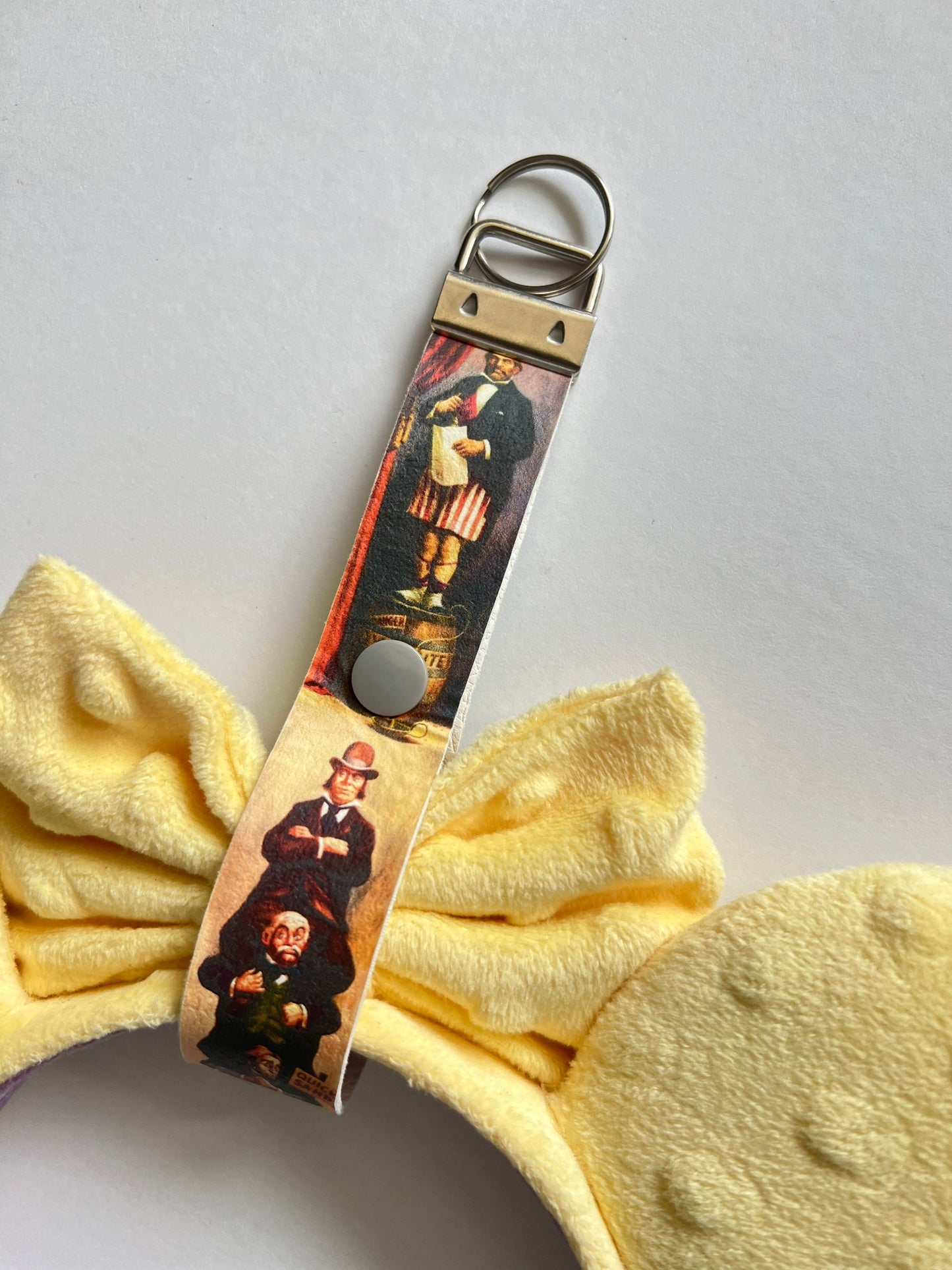 Haunted mansion inspired mouse ear holder, happy haunts key fob, backpack, purse ear saver